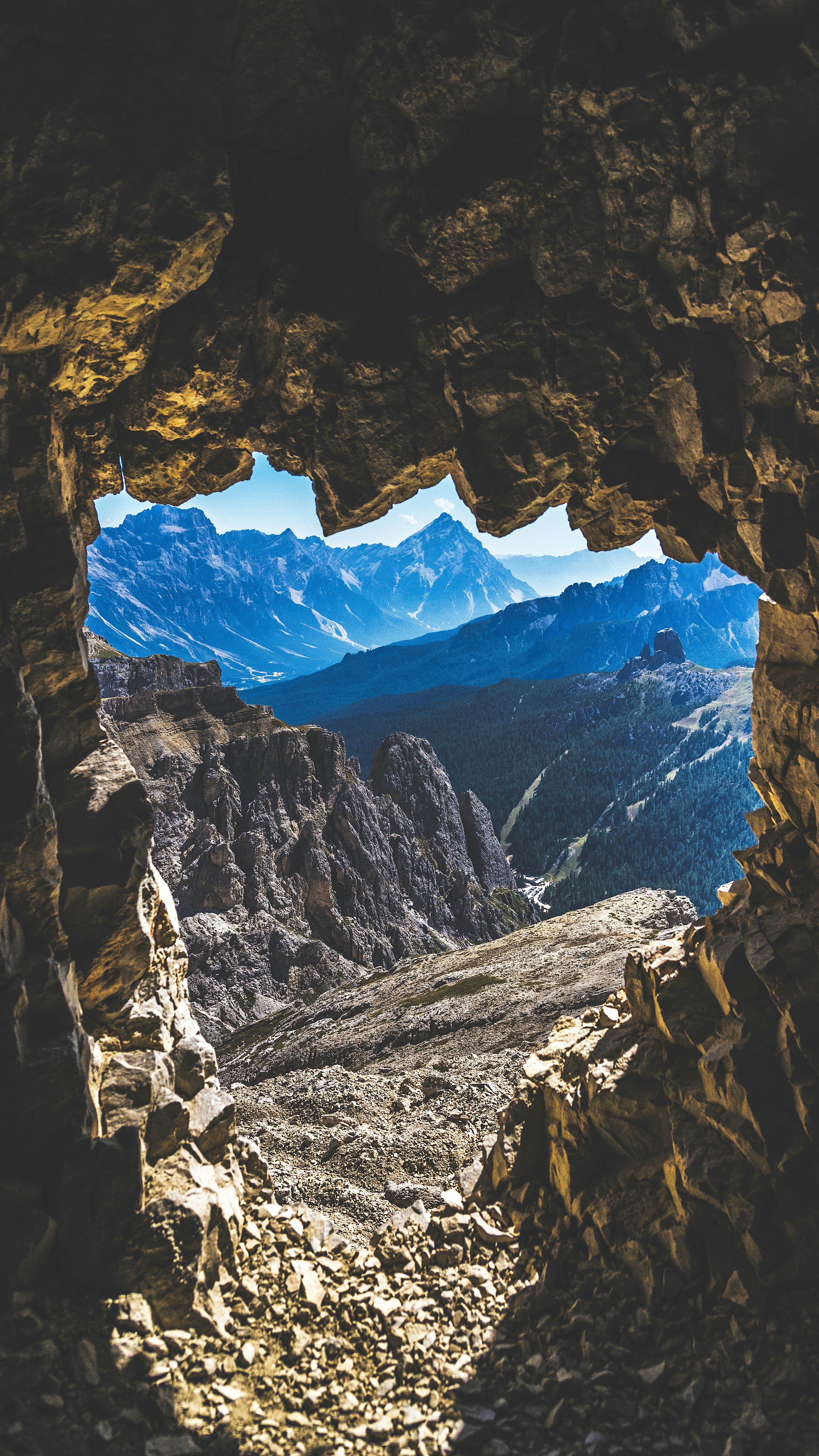 rock mountain under blue sky